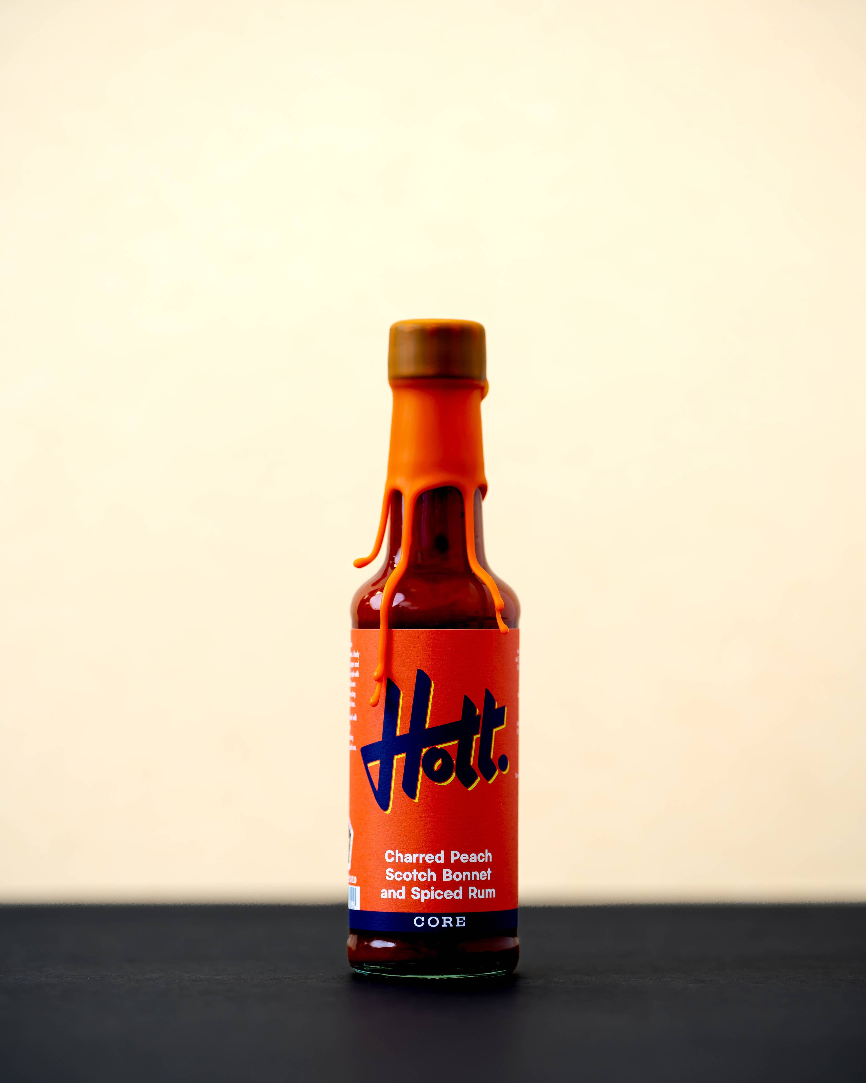 Charred Peach, Scotch Bonnet and Spiced Rum Hott Sauce