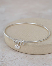 Sterling Silver Shell Charm Bangle: 6cm