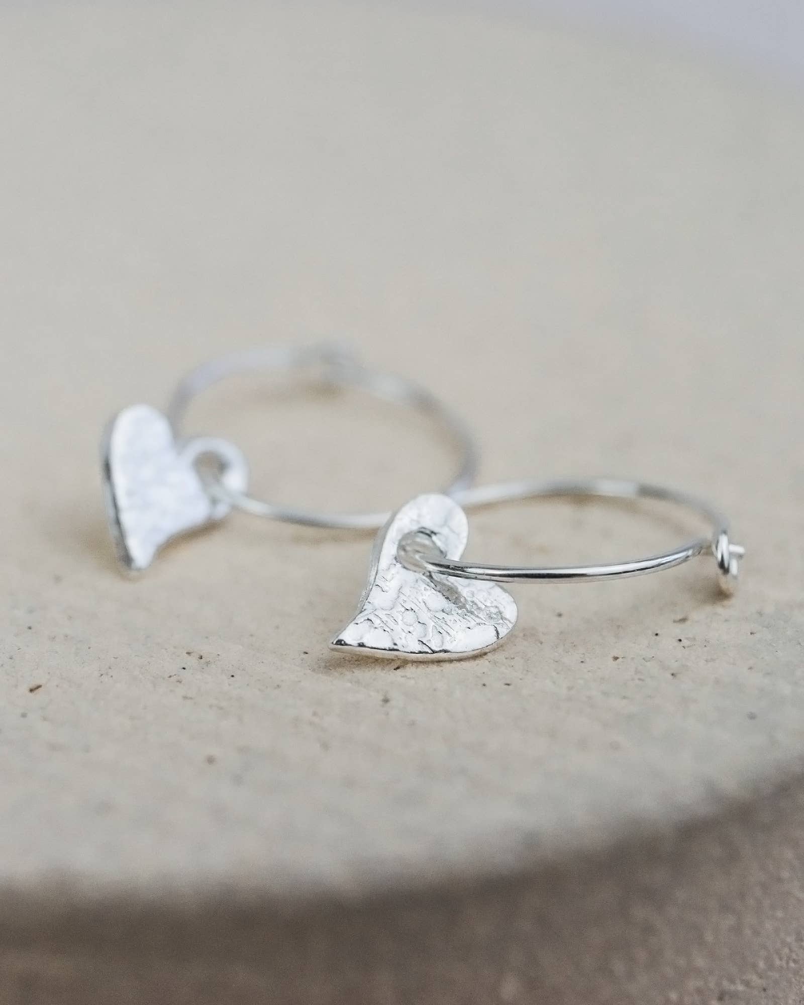 Sterling Silver Tilted Heart Hoops: Classic