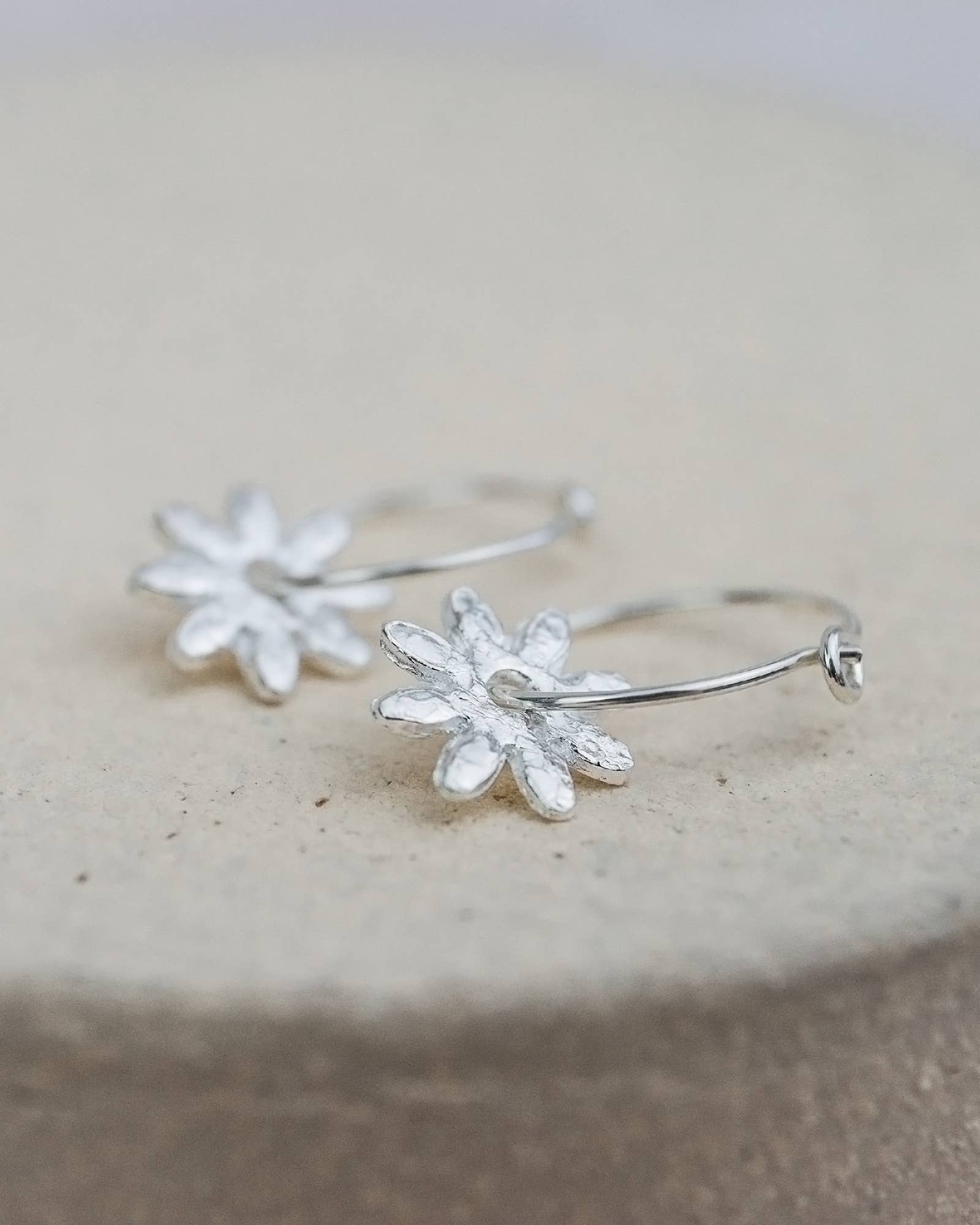 Sterling Silver Daisy Charm Hoops: Classic